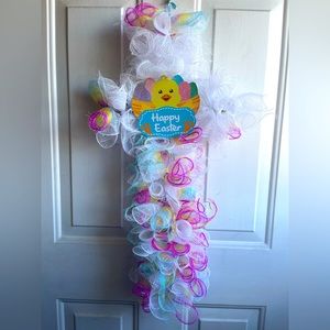 This is cross wreath with colors that can catch your eye